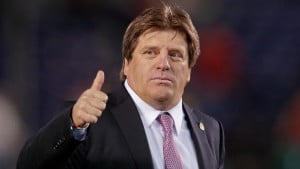 Mexico's head coach Miguel Herrera gestures after defeating Finland 4-2 in a friendly soccer game on Wednesday, Oct. 30, 2013, in San Diego. (AP Photo/Gregory Bull)